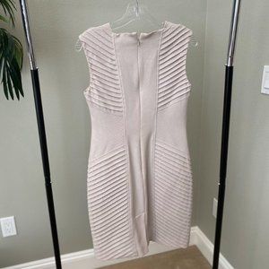Cream figure hugging pleated dress